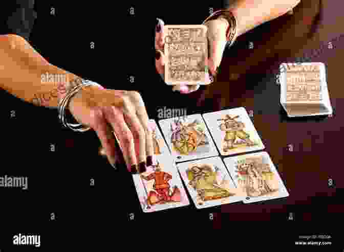 Sherry Torgent Laying Out Tarot Cards On A Table, Her Hands Gracefully Hovering Over Them. The King S Oracle Sherry Torgent